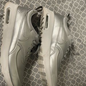 Chrome silver nike air Max’s.